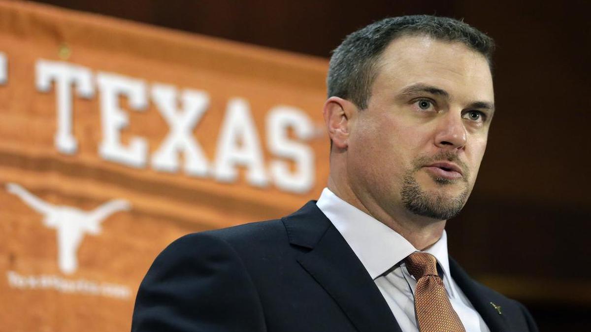 FILE - Tom Herman talks to the media during a news conference where he was introduced as coach of the Texas college football team.