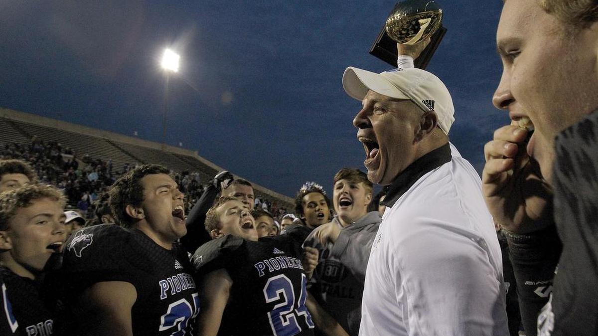 Saginaw Boswell head coach John Abendschan celebrates with his team as they defeated Lubbock 20-10 in 5A Division II Region I semi-final high school football playoff at Memorial Stadium in Wichita Falls on Saturday, November 26, 2016.