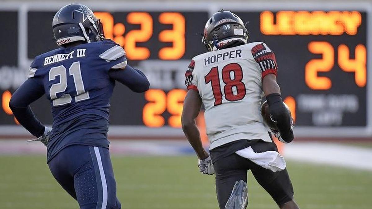 Mansfield Legacy strong safety Jared Hopper (18) returns a fumble against Frisco Lone Star at Gerald J. Ford Stadium in Dallas, Dec. 9, 2017.