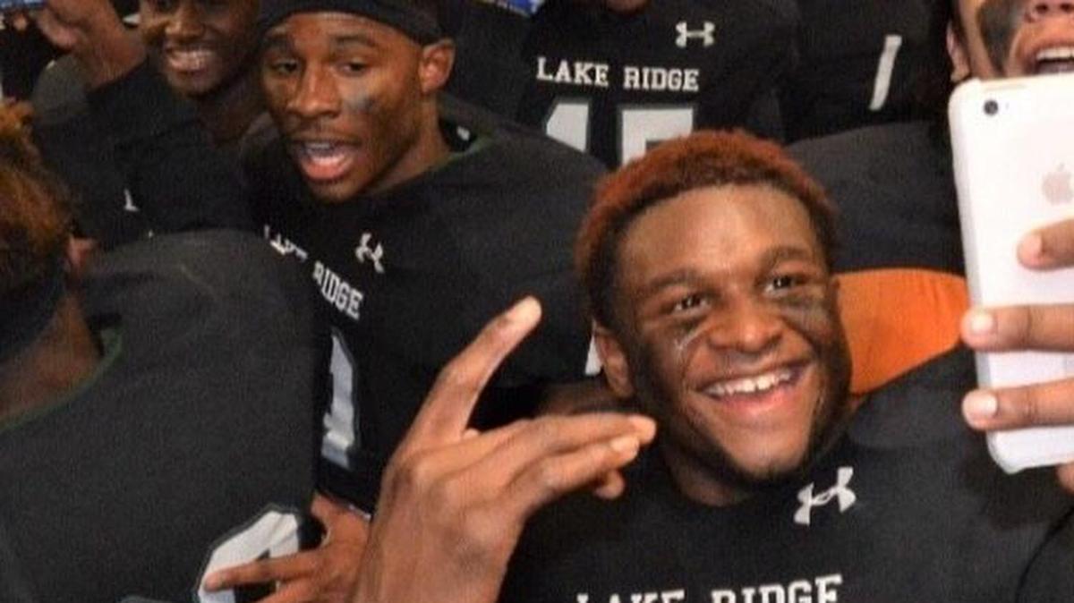 Jayden Williams snaps selfies with his left hand.