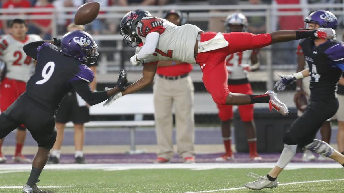Crowley defensive back Garrett Austin (9) breaks up a pass intended for Legacy wide receiver Randy Wright (2) as Mansfield Legacy played Crowley in high school football at Eagle Stadium in Crowley Friday September 08, 2017. Crowley led 7-3 at the half.
