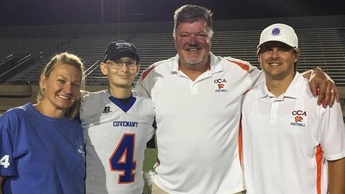 From left, Sheila Cross (mother), Jack Cross, CCA head coach Rick Jackson and Jordan Cross (brother and CCA assistant).