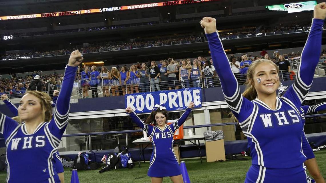 Weatherford cheerleaders perform on the sidelines in the first half of high school football action at AT&T Stadium in Arlington, Texas Friday, Oct. 23 2015.