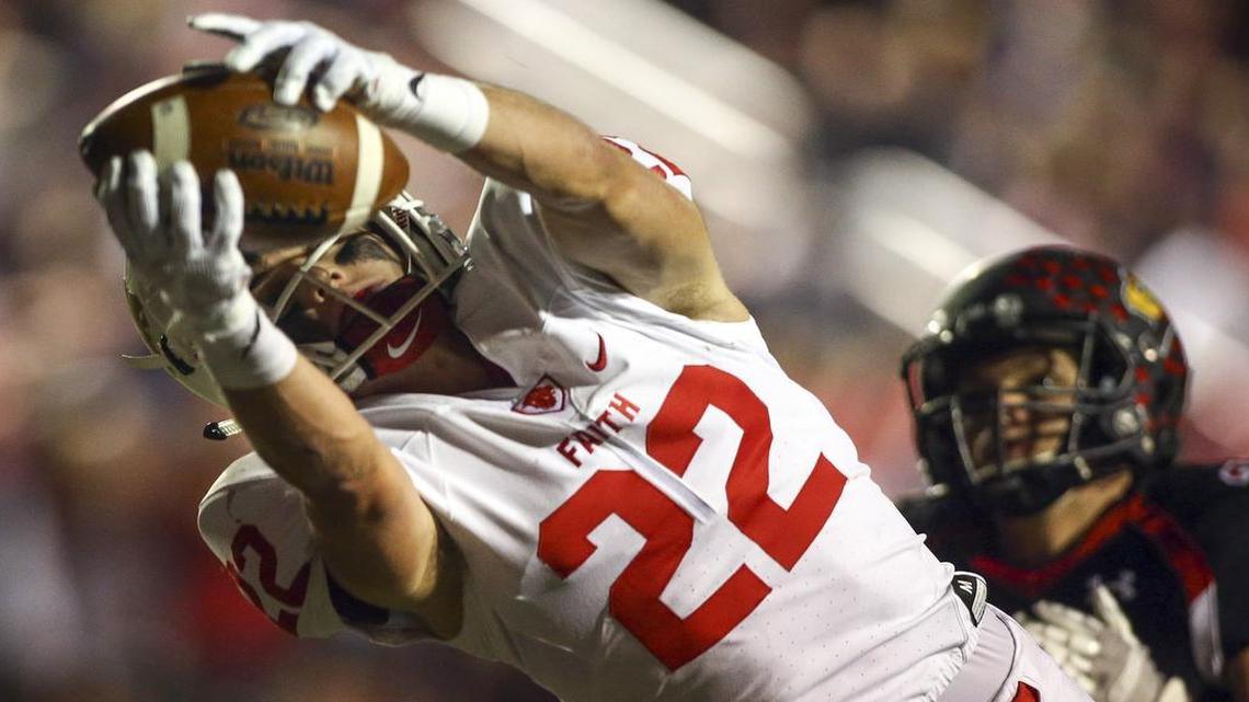 Grapevine Faith’s Jake Mitchell, shown in a game earlier this season, caught a 32-yard touchdown pass to tie the score in overtime. Faith went two extra periods before outlasting Austin Regents for the TAPPS Division II football title.