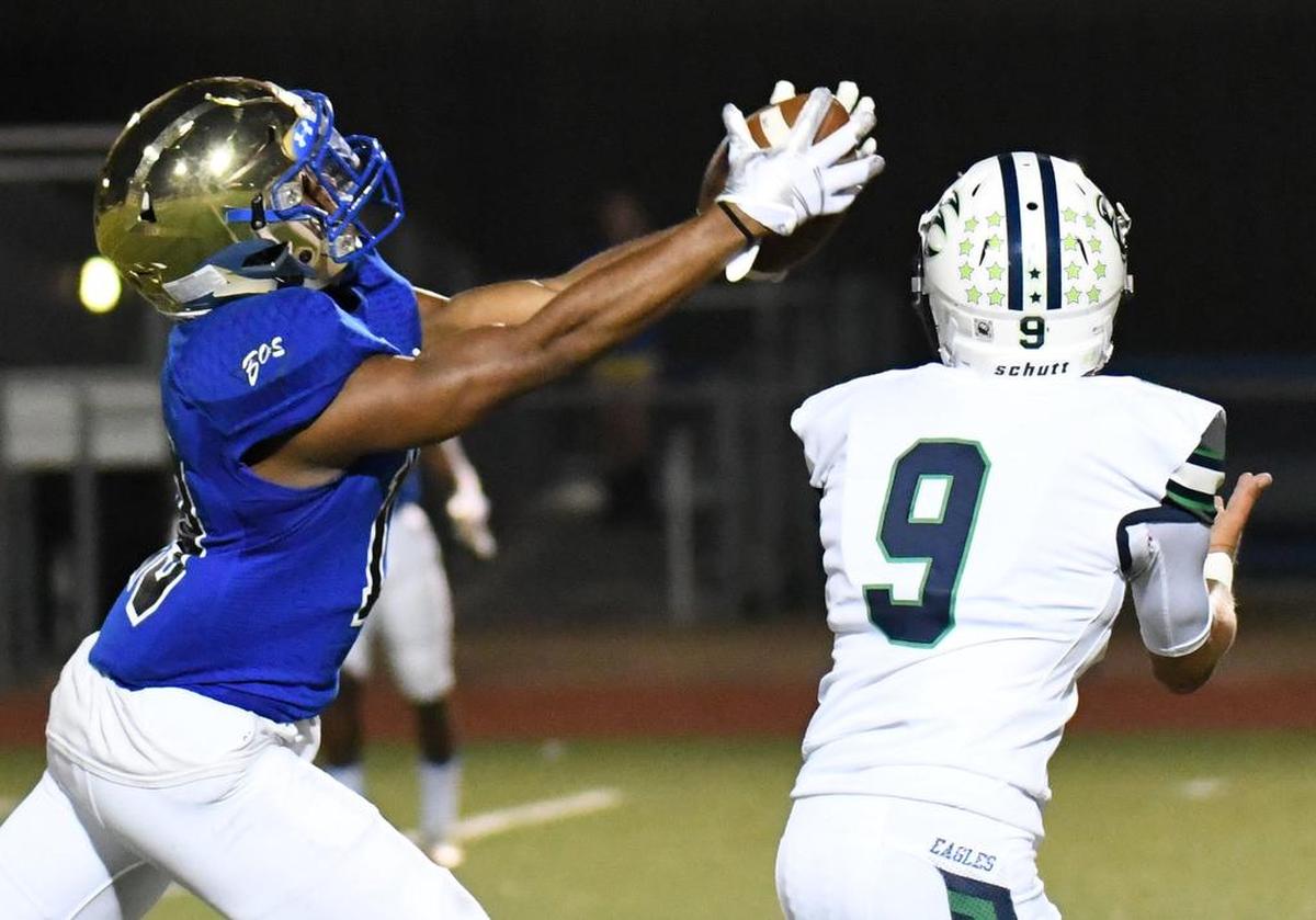 Boswell's Brandon Chatman, left, brings in a catch for a touchdown in front of Eaton's Ryan Hopper.