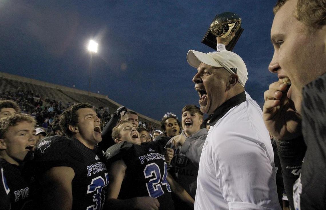 Saginaw Boswell head coach John Abendschan celebrated with his team after a 2016 playoff game. Boswell will move up to Class 6A for the first time during the 2020-22 seasons.