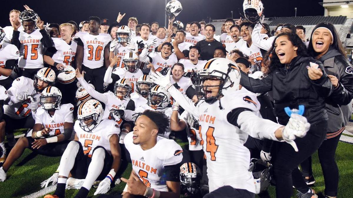 The Haltom football poses for a celebratory picture on the field after their 28-17 win over Keller Central in Thursday’s November 9, 2017 football game at Keller ISD Athletic Center in Keller, Texas. The victory means that Haltom has its first winning season since 2000 and its first play-off spot since 2009.