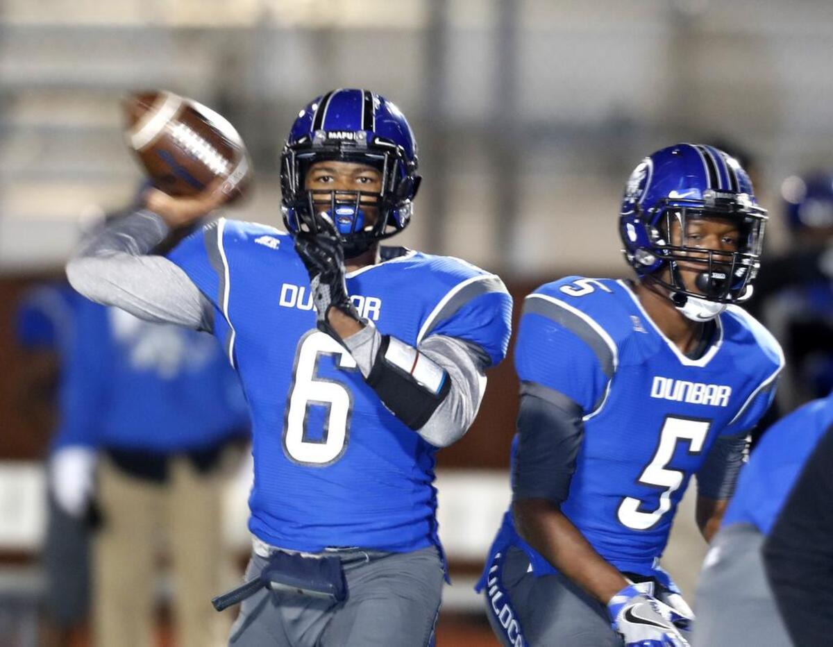 Dunbar quarterback Leon’te Cooper (6), here in a 2016 playoff game, caught a 38-yard touchdown pass Saturday against Sam Houston.