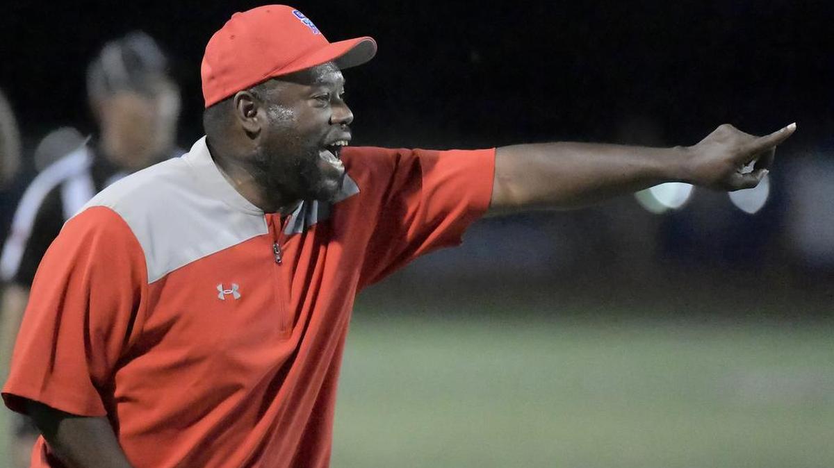Sam Houston Texans head coach Anthony Criss call plays from the sideline on Oct. 5, 2017. When he faced Lamar in his first-ever playoff game, his father, fellow coach Willie Criss, told him, “An Eddy Peach-coached team is always going to be well-prepared.”