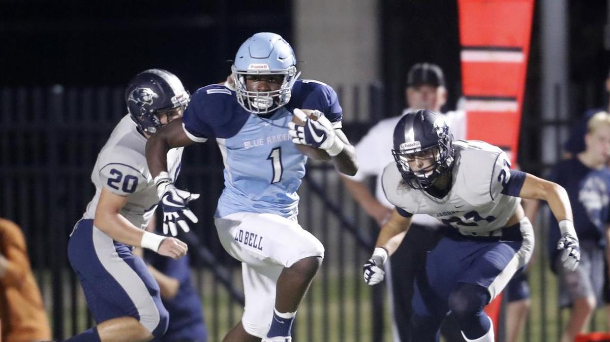 L.D. Bell running back Zion Hardy (1) takes off for long yardage as Flower Mound played L. D. Bell in high school football at Pennington Field Friday October 13, 2017.