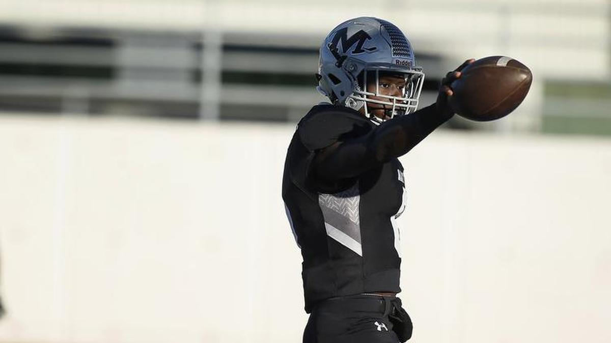 Arlington Martin Warriors quarterback Juma Otoviano (8) reacts after scoring a rushing touchdown against the Odessa Permian Panthers.