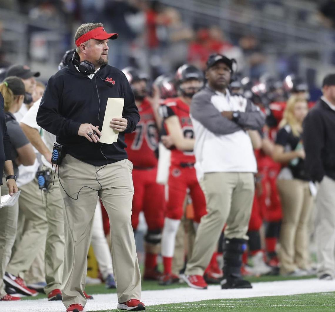 Heritage head coach Joe Willis watches action in the second quarter as Colleyville Heritage played Denton Ryan in a State Quarterfinals high school football playoff game at AT&T Stadium Saturday morning Dec. 03, 2016.
