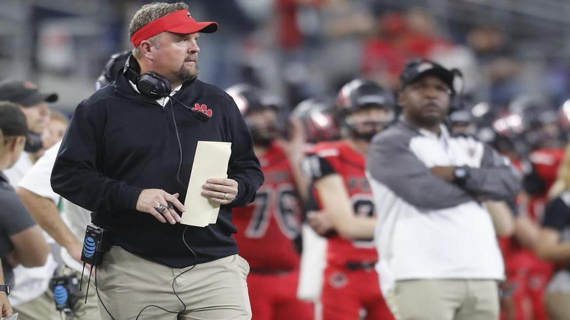 Heritage head coach Joe Willis watches action in the second quarter as Colleyville Heritage played Denton Ryan in a State Quarterfinals high school football playoff game at AT&T Stadium Saturday morning Dec. 03, 2016.