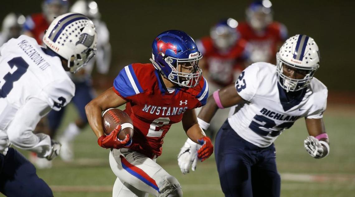 Grapevine Mustangs wide receiver Jordan Brooks-Wess (2) against Richland during a game in 2017.