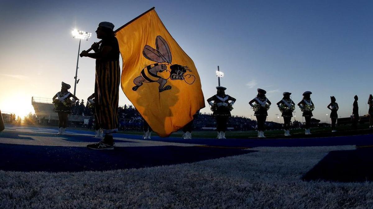 Cleburne “Crazie” Spencer Suitt gets ready to run with the team at the start of the game.