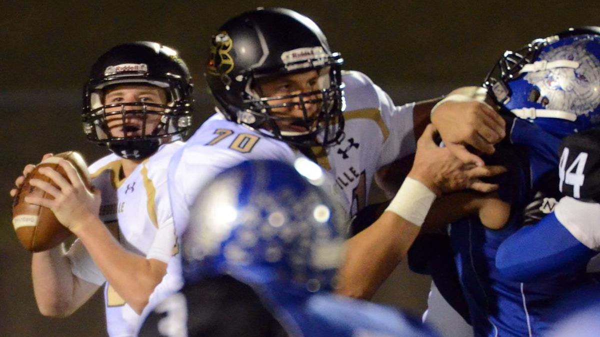 Quaterback Clayton Beeter, left, and lineman Jared Hocker help lead an experienced Birdville offense.