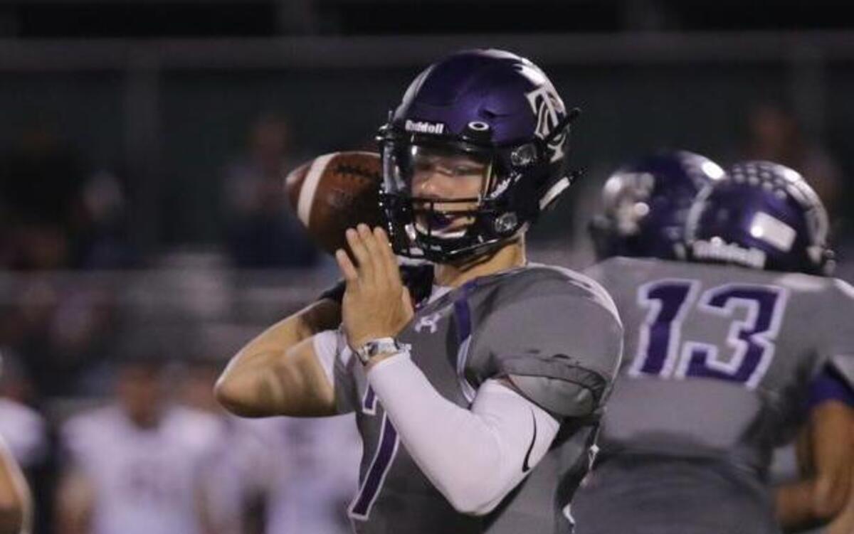 Keller Timber Creek quarterback Cade Schrader throws a pass during a non-district game against Denton at Keller ISD Stadium, Sept. 15, 2016.