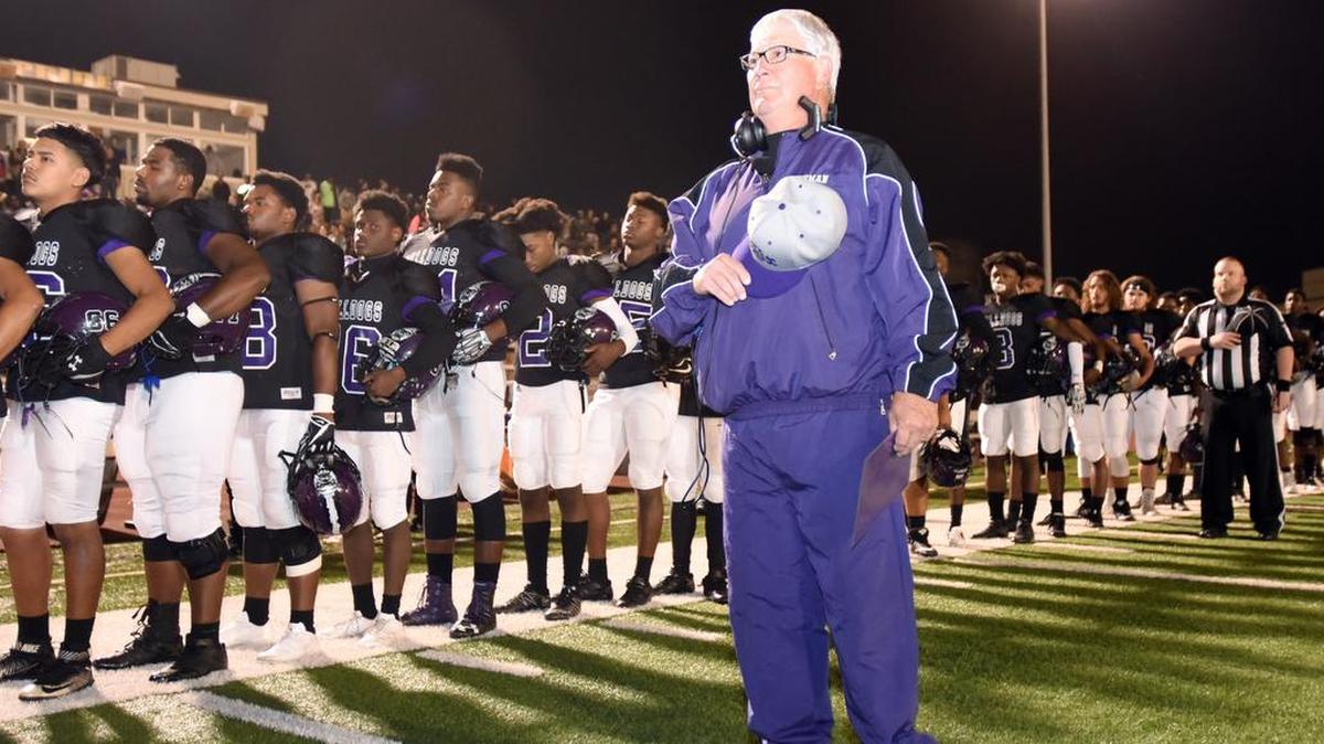 Everman coach Dale Keeling during the national athem with his team before playing Crowley, Nov. 3, 2017 at J.E. Marr Stadium in Everman.