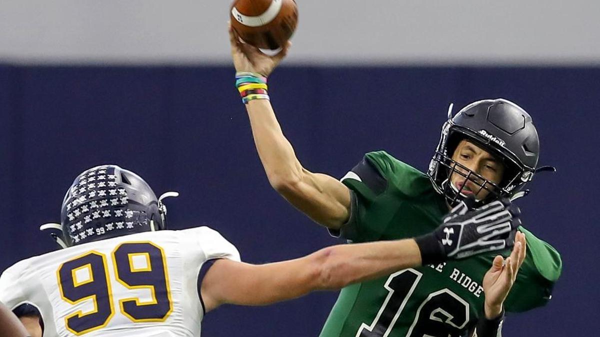 In the 2016 playoffs, Mansfield Lake Ridge quarterback Jason Bean (16) spots a receiver against Highland Park.