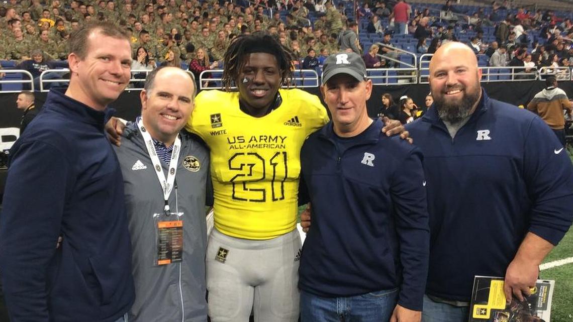 U.S. Army All-American Blinebacker DaShaun White (21) joined by his Richland High coaches, from left Klint King, Ged Kates, Kerby Cromwelll and Monte Sparkman. White switched his commitment from Texas A&M to Oklahoma hours after the Jan. 6, 2018 game.
