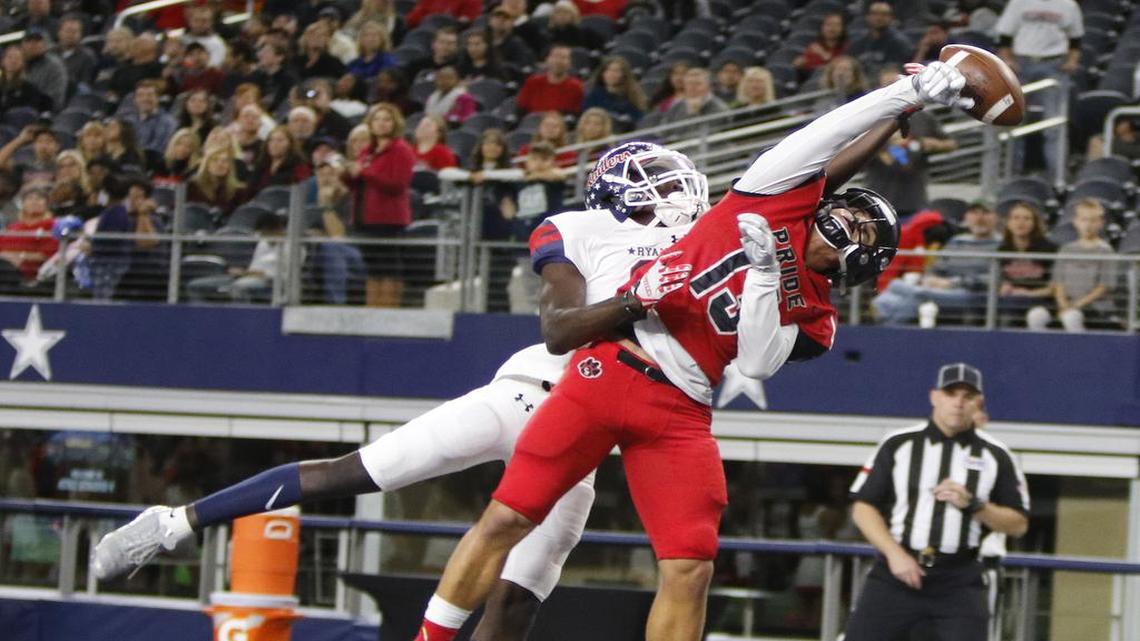 Heritage defensive back Caleb Murphy (13) defends a ball in last year’s playoffs. Murphy was going to move to offense this season, but he may play on both sides following the departure of Marcus Mosley.