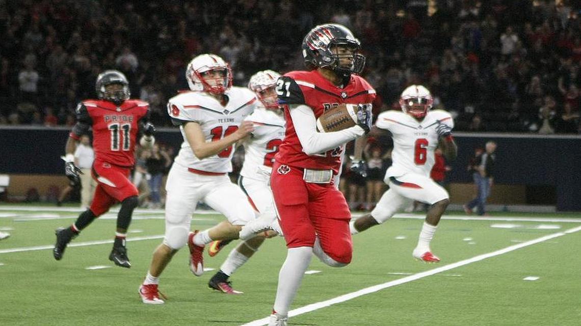 Colleyville Heritage's Kameron Brown returns a kickoff for a touchdown against Northwest in the fourth quarter of a 5A Division I Region I area playoff game at The Star in Frisco on Saturday, November 19, 2016.