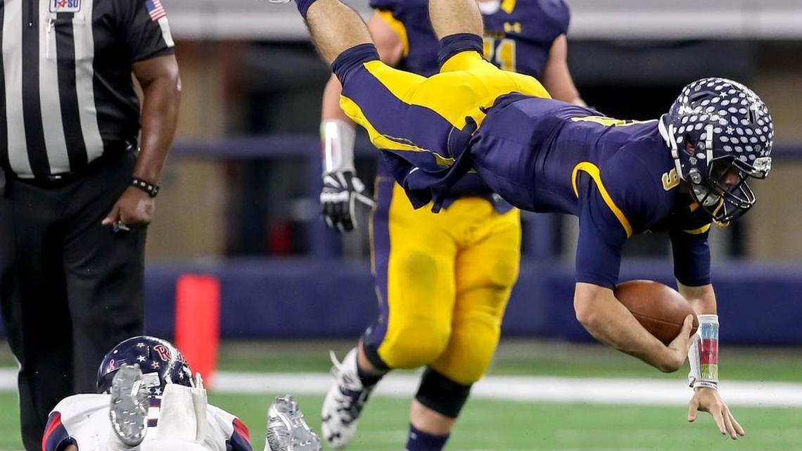 Highland Park quarterback John Stephen Jones went airborne against Denton Ryan during the second half of the 5A Division I State semifinals last Saturday afternoon at AT&T Stadium in Arlington. Jones is the son of Dallas Cowboys COO Stephen Jones and the grandson of Cowboys owner Jerry Jones.