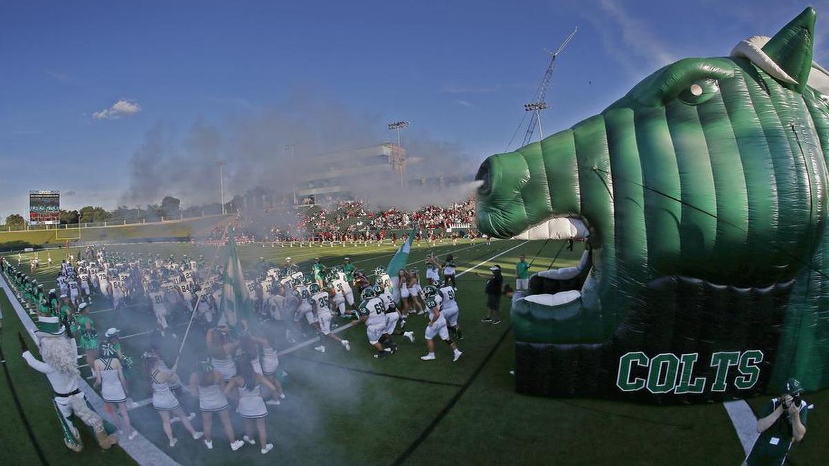 The Arlington High Colts take the field at the Gopher Warriors Bowl as Arlington High plays South Grand Prairie in Grand Prairie, Thursday, August 25, 2016.
