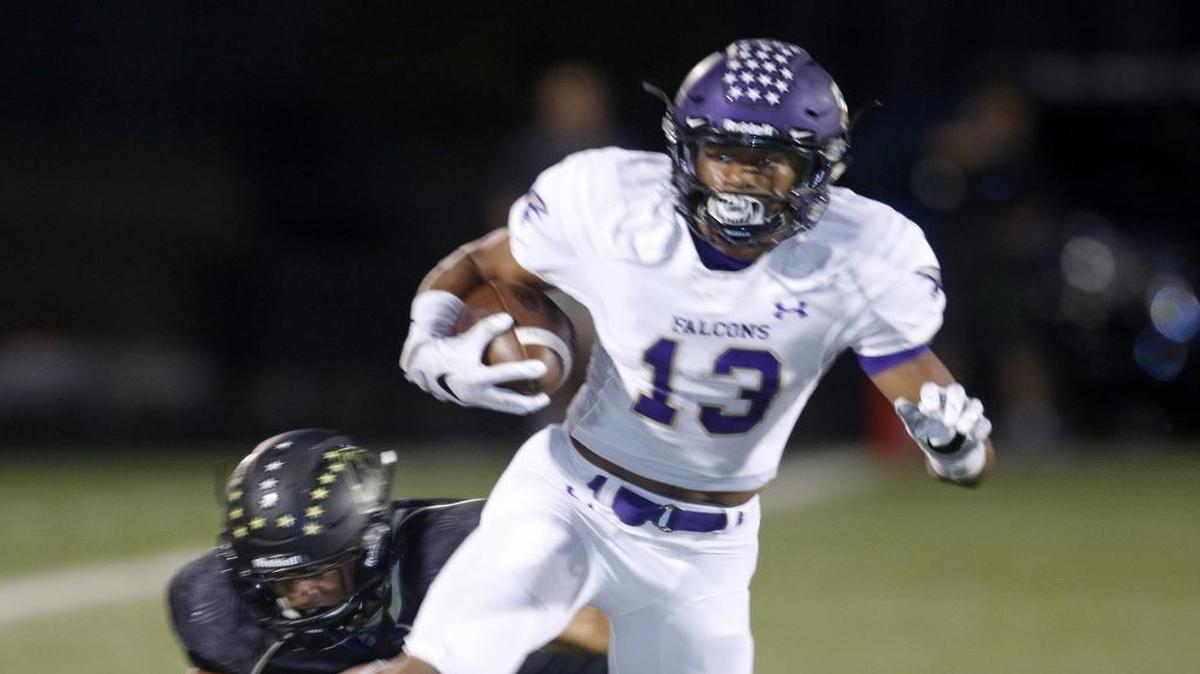 Timber Creek wide receiver Erik Ezukanma (13) shakes the Fossil Ridge defense as Timber Creek played Fossil Ridge at KISD Stadium Sept. 23, 2016.