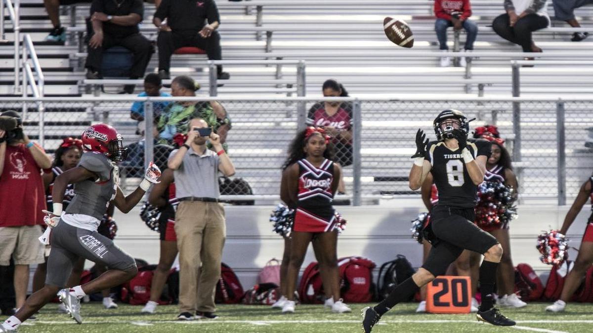Mansfield wide receiver Jackson Gleeson (8) catches a long pass for a touchdown during a high school football matchup between Mansfield and Cedar Hill on Sept. 8, 2017, at R.L. Anderson Stadium in Mansfield.