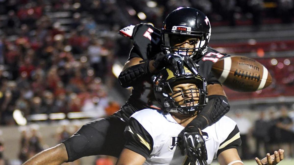 Former Trinity safety Cam’ron Jones, 17, breaks up the pass intended for Broken Arrow receiver Devin Clayton in the endzone during the second quarter of Friday's, August 26, 2016 football game.