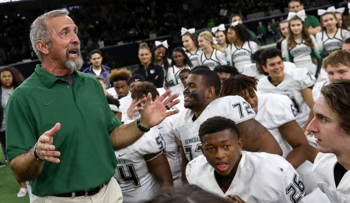 Kennedale head coach Richard Barrett talks with his team after beating Kaufman 63-36 in the high school football 4A Division I, Region II finals played at the Ford Center at The Star in Frisco.