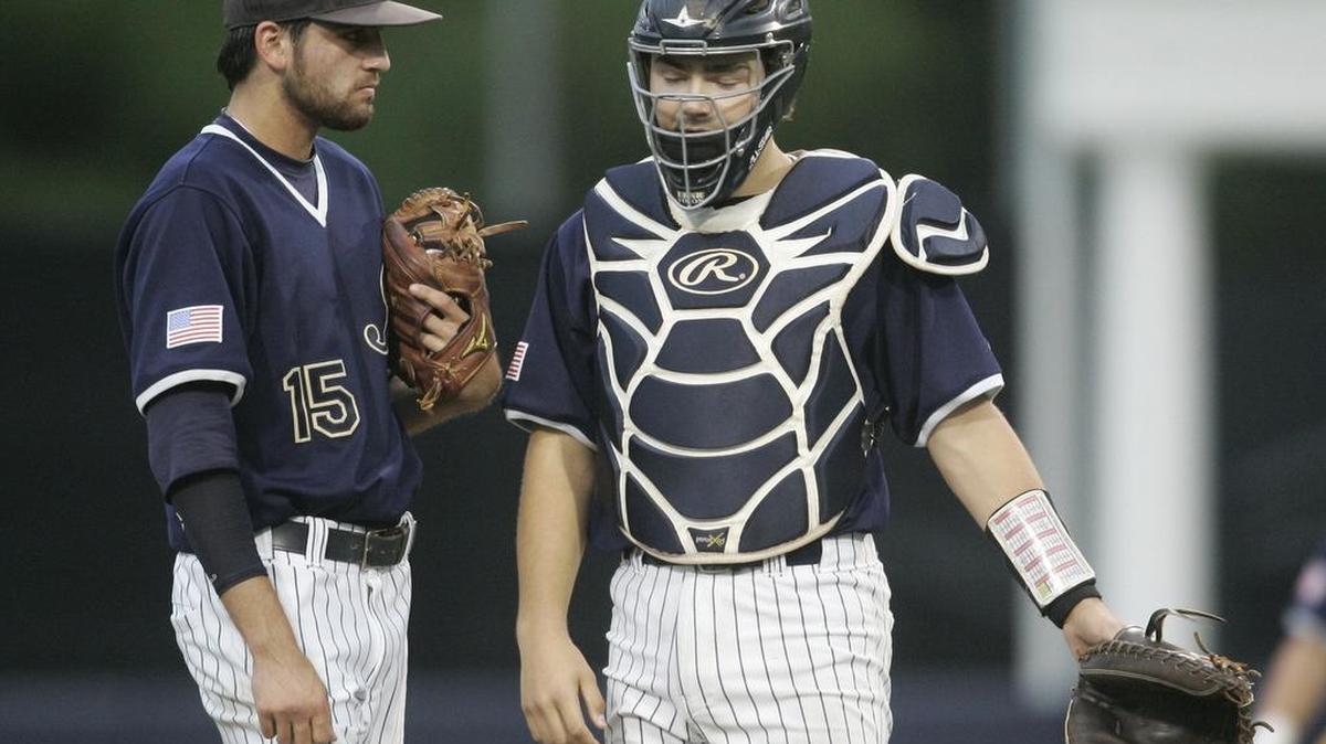 Keller starting pitcher Zane Wilkinson, left, with catcher Shea Langeliers, gave up only one run in 3 2/3 innings Thursday in Game 1 against Hebron.