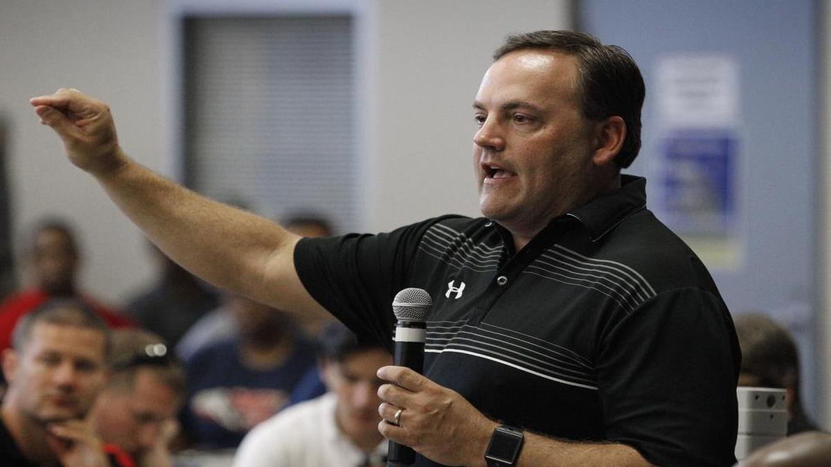 Arlington ISD Athletic Director Kevin Ozee meets with coaches at Lamar High School, Wednesday, August 3, 2016.
