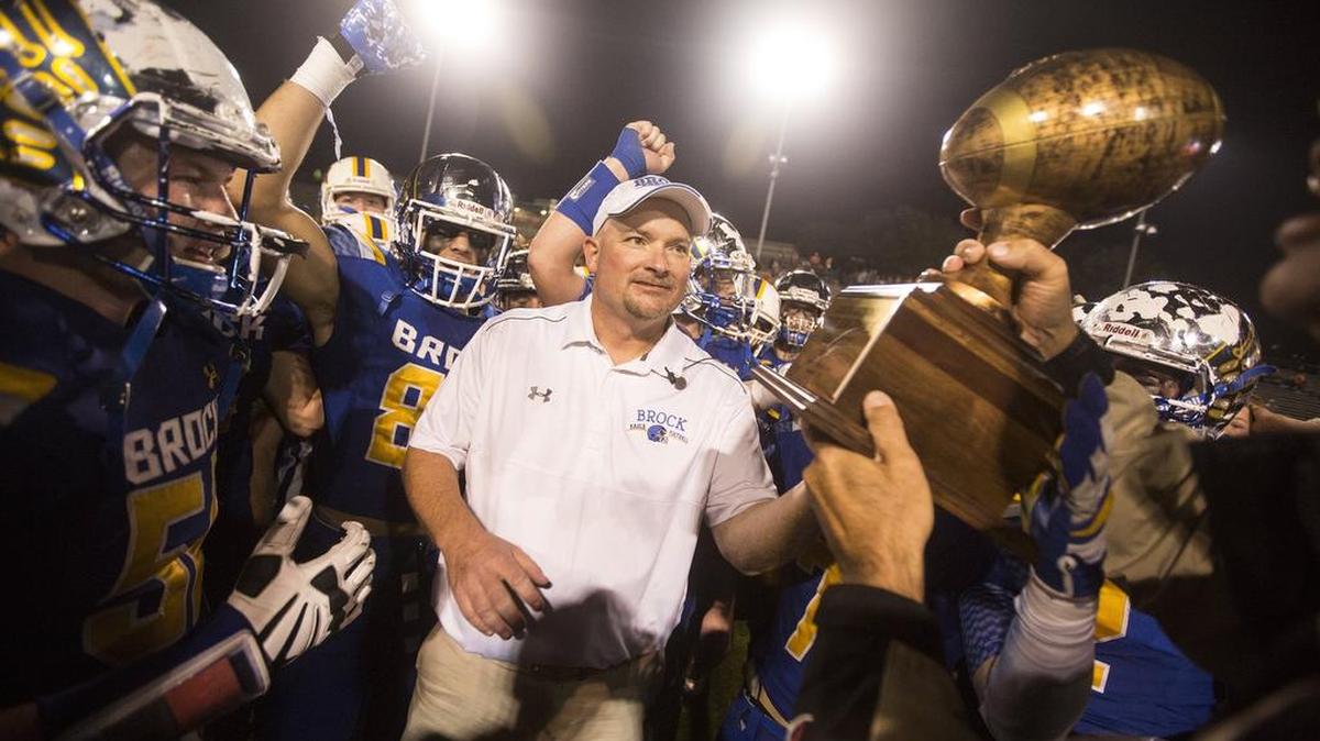 Coach Chad Worrell celebrates with the Brock Eagles after a 38-22 win over Mineola in a 3A Div. 1 semifinal in Grand Prairie. Brock will play Cameron Yoe for the championship.