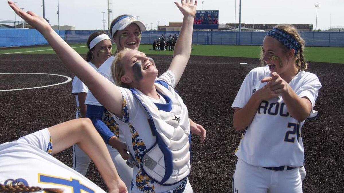 Brock sophomore catcher Anarenee Beyer, center, celebrates with teammates Katie Severson, right, and Bailey Ray, background, as the Eagles defeated Palmer in Game 2 of the best-of-three UIL softball 3A regional quarterfinals on May 14.