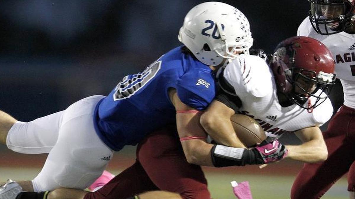 Boswell middle linebacker Hunter Harp, making the tackle, had 112 stops last season for the Pioneers, who advanced to the second round of the playoffs. Boswell opens the season Aug. 26 against Burleson Centennial, the team that beat the Pioneers in the area round.