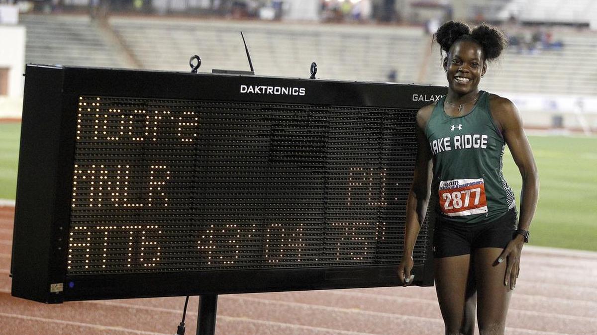 Mansfield Lake Ridge sophomore Jasmine Moore breaks the Class 5A state triple jump record with a mark of 43 feet, 4 3/4 inches in Austin on Thursday, May 11, 2017.