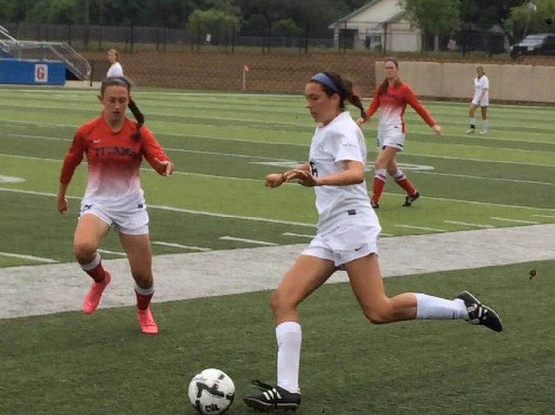 Grapevine’s Brianna Gajewski advances the ball up the sideline during the second half of Saturday’s Class 5A final against Frisco Centennial at Georgetown ISD Athletic Complex.