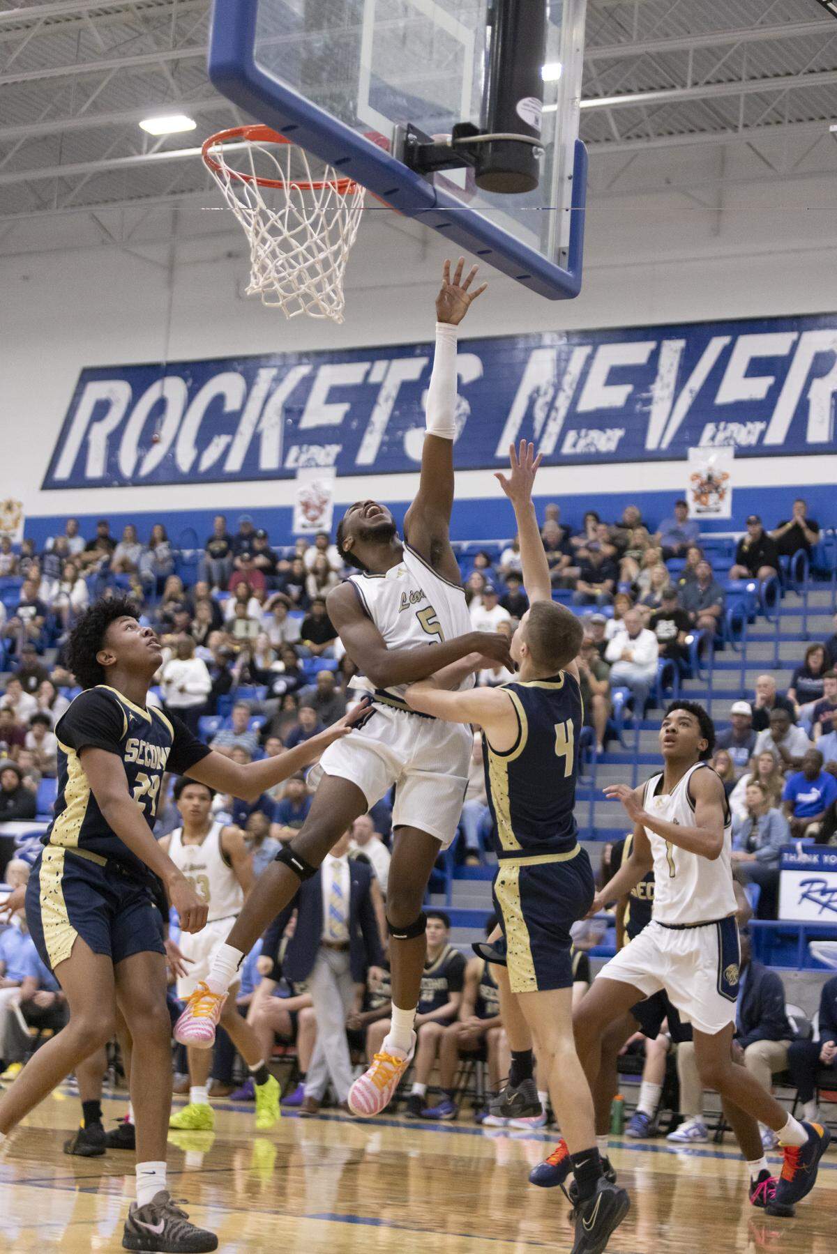 Arlington Grace Prep’s Tre Green battles in the paint against Houston Second Baptist on Saturday.
