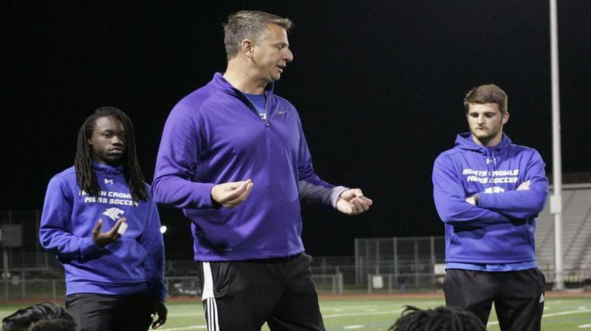 North Crowley head coach Browning Stupp talks to the team along with assistants Daniel Lockridge and David Henley during a game at Arlington Lamar High School on March 4.