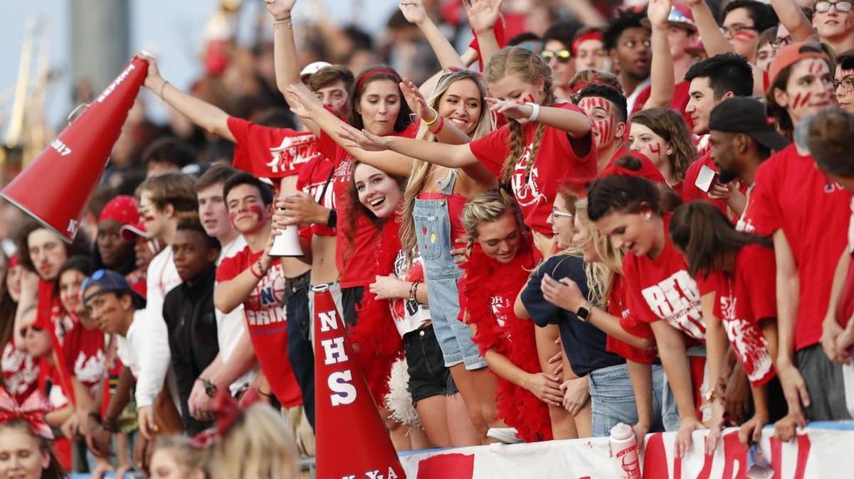 Northwest fans cheer their team at Northwest HS Stadium in Justin, Texas.