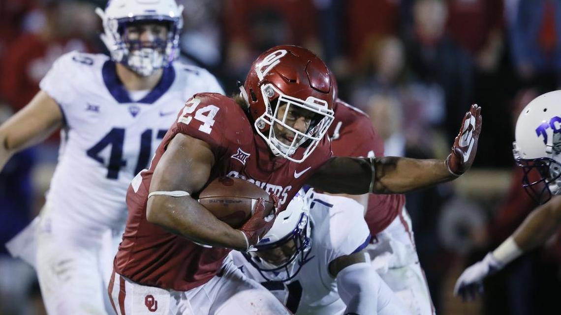 TCU will have to slow down Oklahoma's Rodney Anderson (24) if it has any chance of winning the Big 12 championship on Saturday at AT&T Stadium. (AP Photo/Sue Ogrocki)