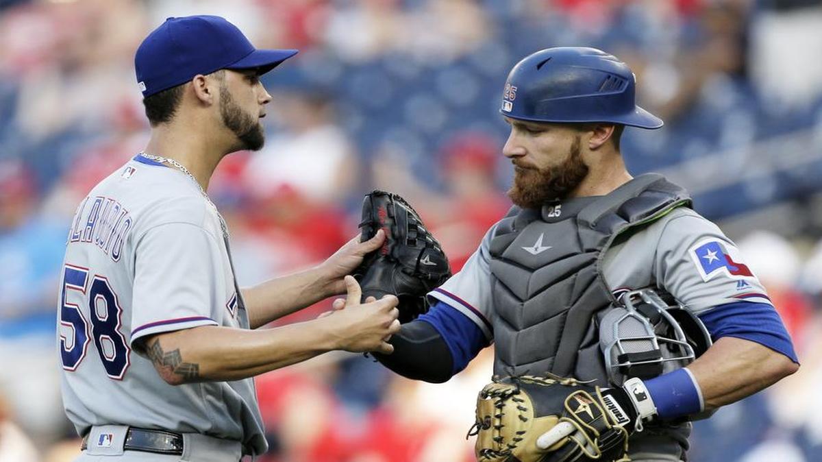 Relief pitcher Alex Claudio, left, catcher Jonathan Lucroy and the Texas Rangers try to build momentum Tuesday when the take on the Astros in Houston in the second of a three-game series. The game will be televised at 7 p.m. on Fox Sports Southwest and Root Sports.