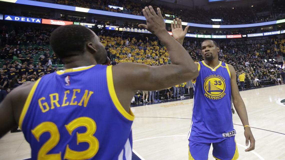 Draymond Green, left, Kevin Durant and the Golden State Warriors try to close out the Utah Jazz on Monday in Game 4 of the Western Conference semifinals. The game will be televised at 8 p.m. on TNT.
