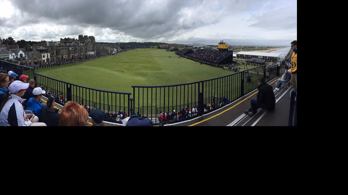 
View from the stands: The left side (darker grass) is the 18th hole and the right side is the first hole.
