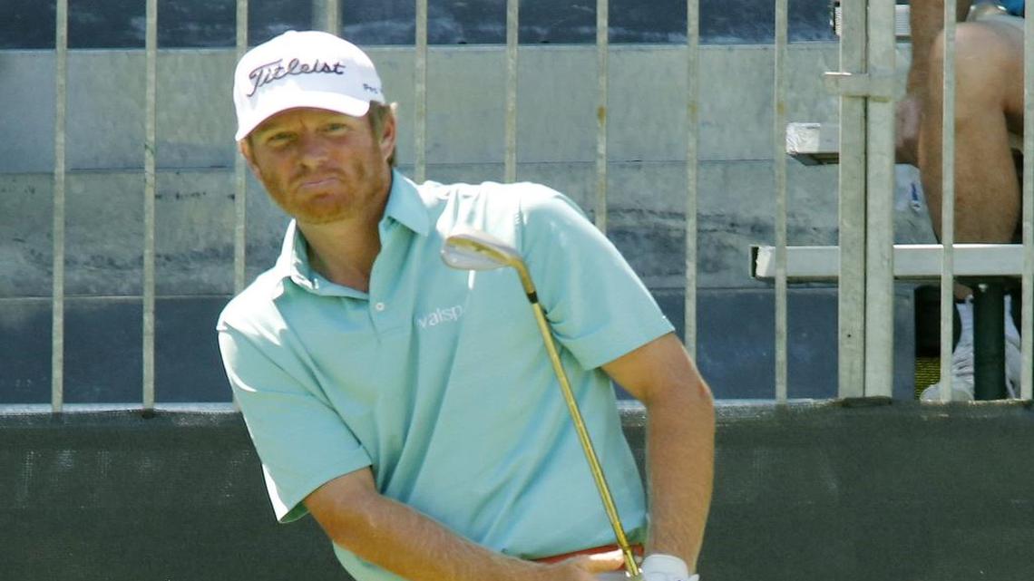 Derek Fathauer, the early first-round leader at the Dean & DeLuca Invitational, watches his chip to the 9th green in Thursday’s round. Fathauer opened with a 65.