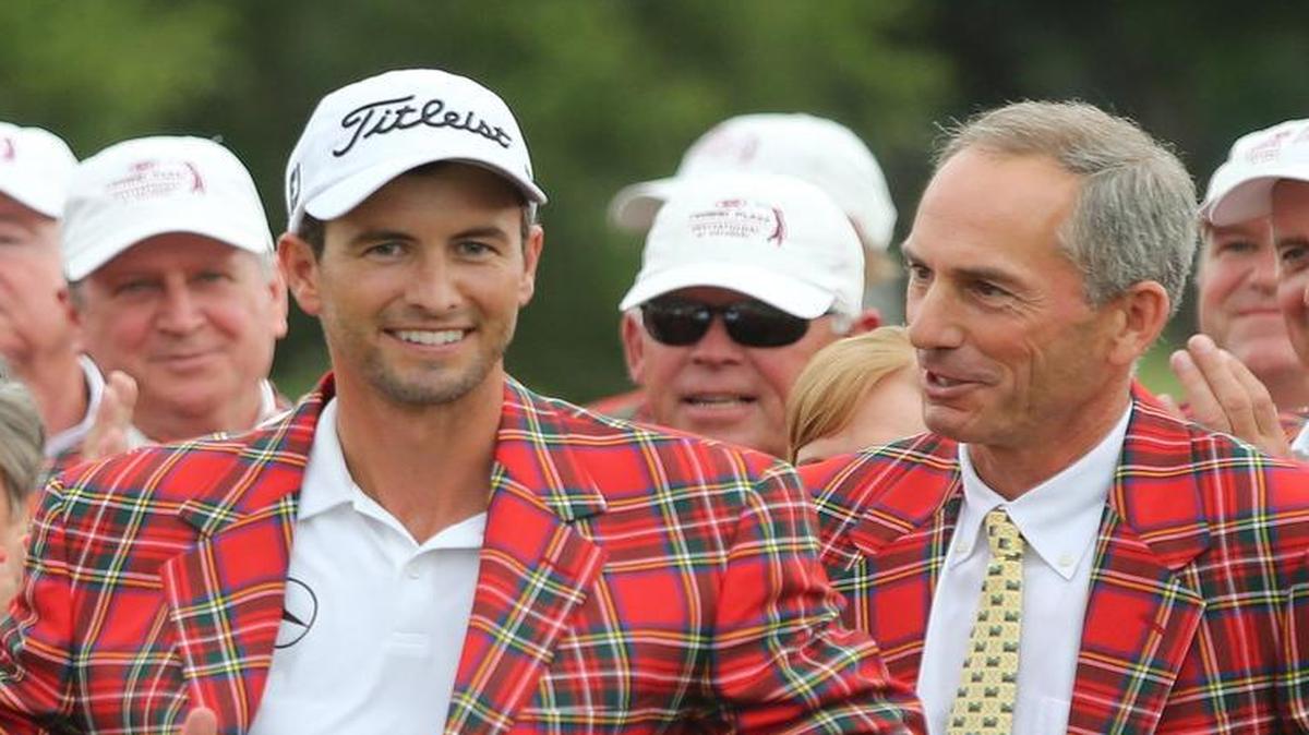 Adam Scott, left, accepts the winner’s plaid jacket from Colonial golf pro Dow Finsterwald Jr. after his playoff win in the Crowne Plaza Invitational at Colonial in Fort Worth, Texas on May 25, 2014.