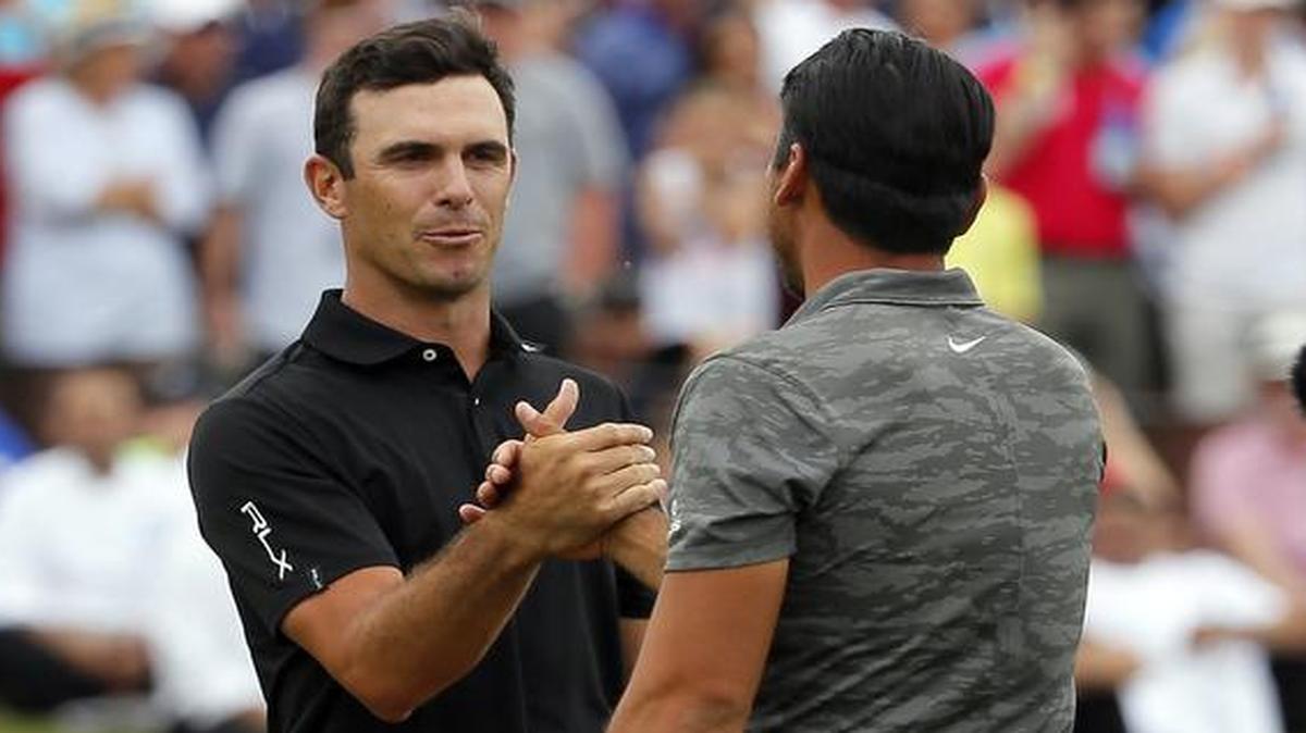 Billy Horschel, left, and Jason Day, right, shake hands after their playoff round in the Byron Nelson golf tournament, Sunday, May 21, 2017, in Irving, Texas. Horschel won the tournament. On Monday, Brittany Horschel, Billy’s wife, revealed her battle with alcoholism and her one-year sobriety.