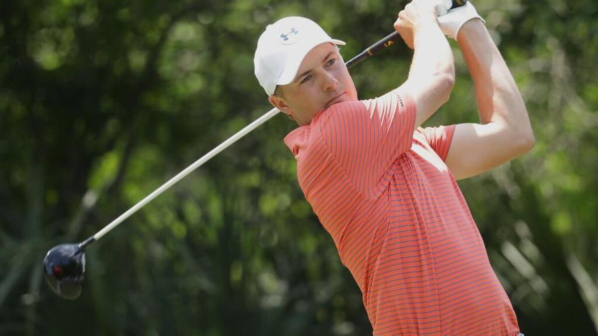 Jordan Spieth, hitting during The Players Championship, teed up a trick shot that seemed darn-near impossible during a clinic on Tuesday.
